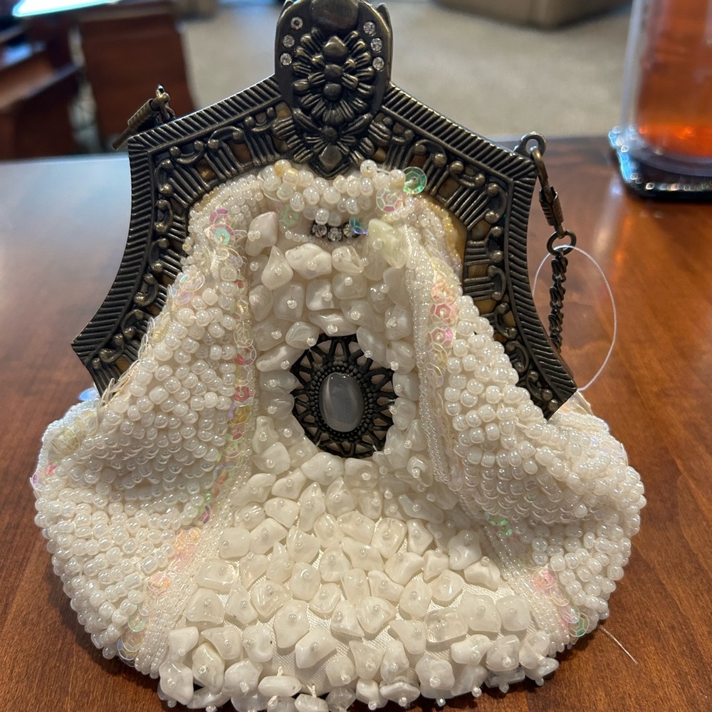 Fancy white purse.